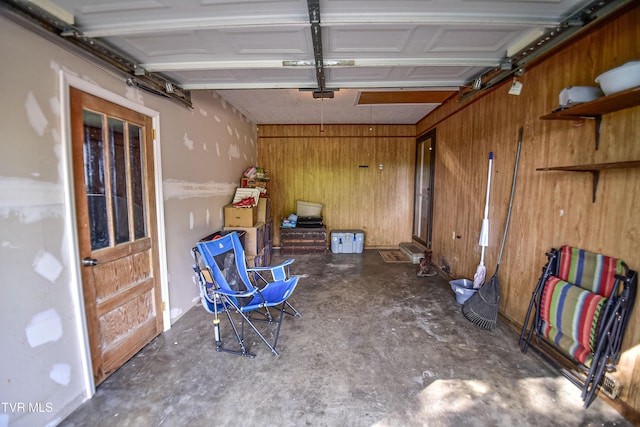 132 Hankal Rd, Gray, TN 37615 - garage featuring wood walls and a garage door opener