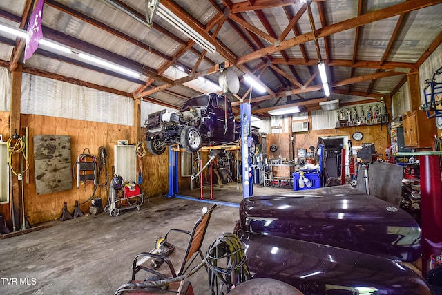 132 Hankal Rd, Gray, TN 37615 - garage featuring wooden walls and a workshop area