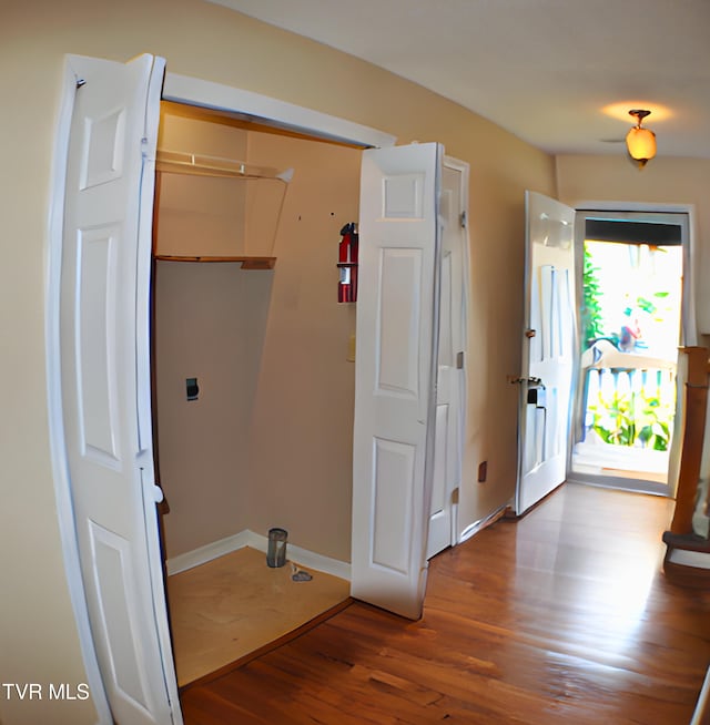 2700 Indian Ridge Rd Unit 23, Johnson City, TN 37604 - laundry room featuring wood finished floors and baseboards