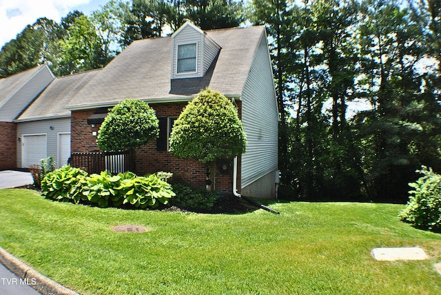 2700 Indian Ridge Rd Unit 23, Johnson City, TN 37604 - view of front of property with brick siding, a front lawn, and a garage