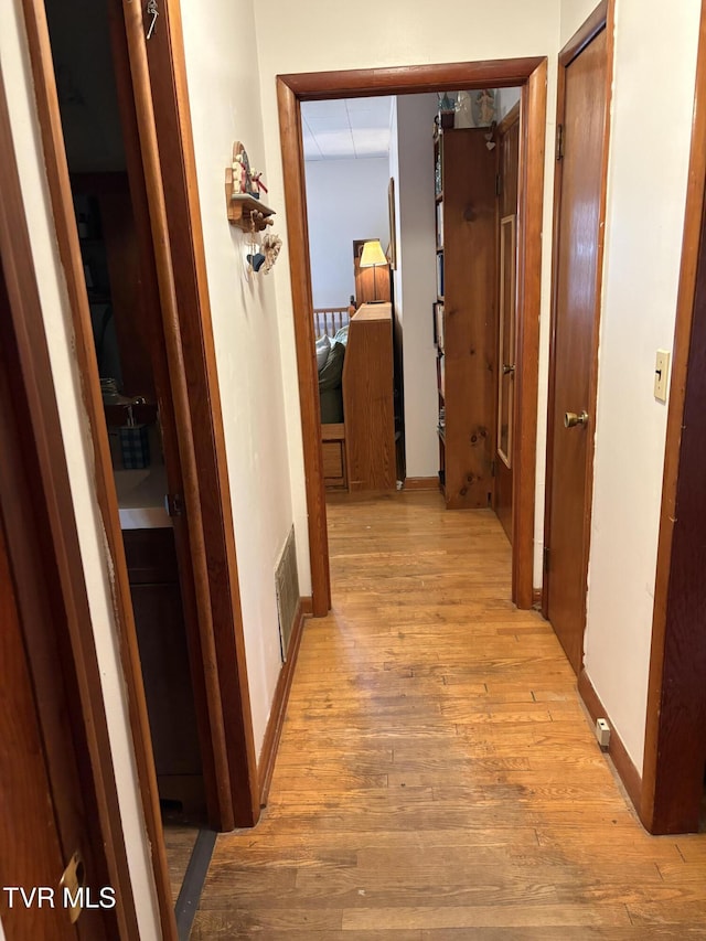 211 Arthur G Caudill Rd, West Jefferson, NC 28694 - corridor featuring light wood finished floors and baseboards
