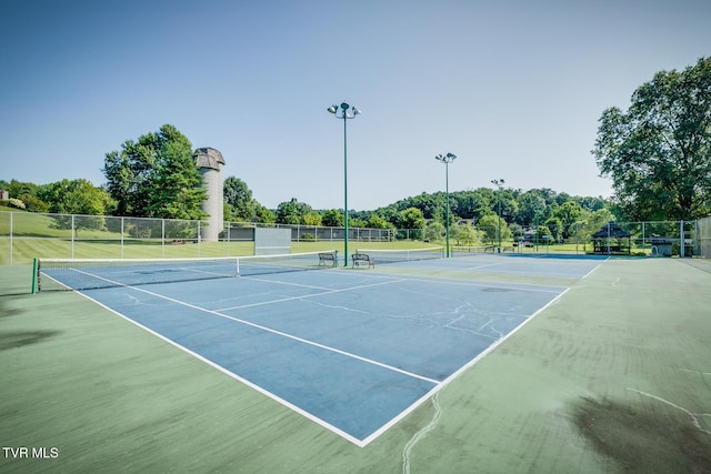view of sport court with fence and community basketball court