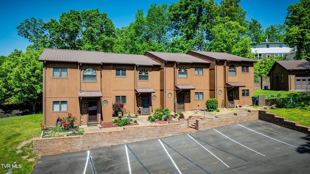 1127 Timbers E ., Unit Greeneville, TN 37745 - multi unit property featuring metal roof, uncovered parking, and a front lawn
