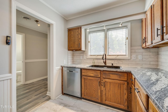 1127 Timbers E ., Unit Greeneville, TN 37745 - kitchen featuring dishwasher, a sink, brown cabinetry, decorative backsplash, and stone counters