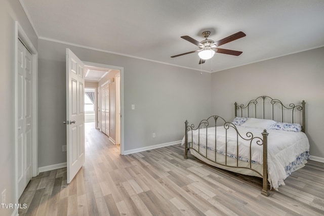 1127 Timbers E ., Unit Greeneville, TN 37745 - bedroom featuring light wood finished floors, a closet, baseboards, and crown molding