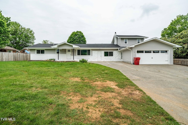 2503 Buffalo Rd, Johnson City, TN 37604 - view of front facade featuring an attached garage, concrete driveway, a chimney, and stone siding