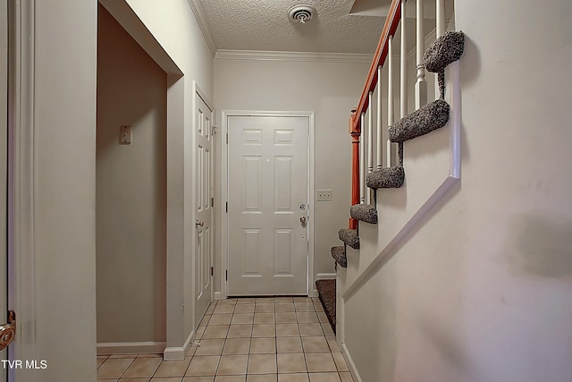 33 Oak Leaf Cir Unit 33, Johnson City, TN 37601 - doorway to outside featuring stairway, light tile patterned floors, a textured ceiling, crown molding, and baseboards
