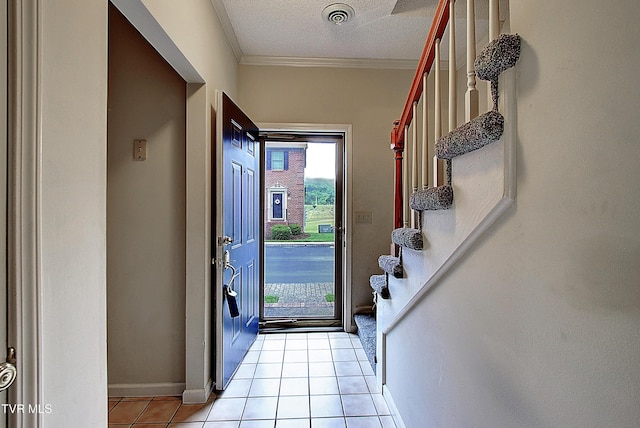 33 Oak Leaf Cir Unit 33, Johnson City, TN 37601 - entryway with stairway, light tile patterned floors, crown molding, baseboards, and a textured ceiling