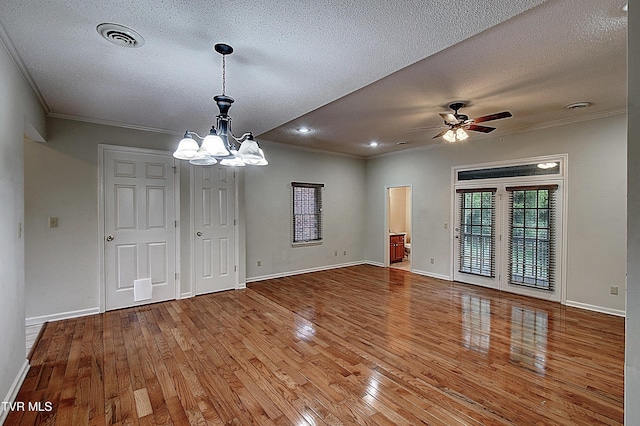 33 Oak Leaf Cir Unit 33, Johnson City, TN 37601 - unfurnished dining area with crown molding, hardwood / wood-style flooring, a chandelier, a textured ceiling, and baseboards