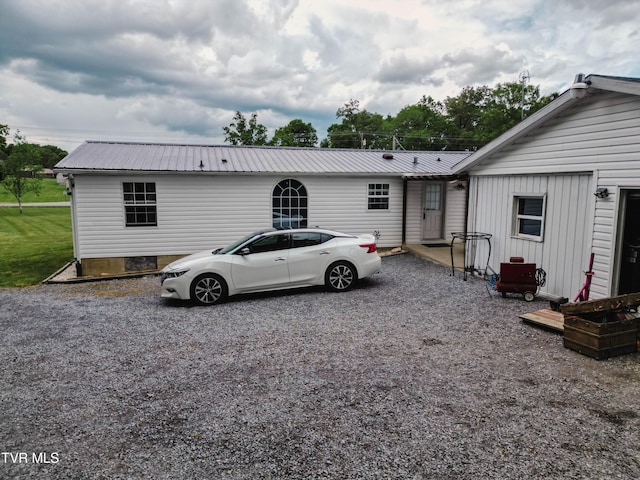 view of front facade featuring metal roof
