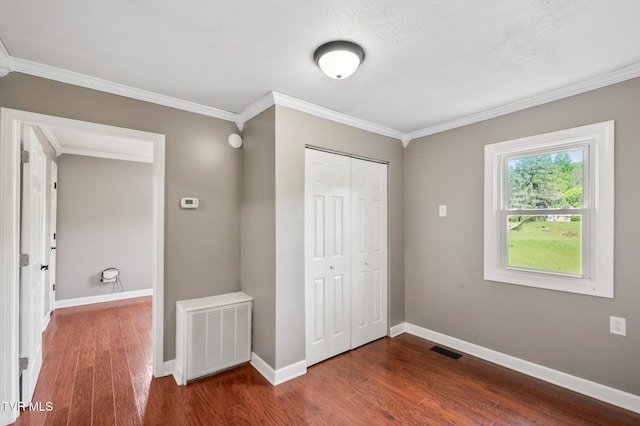 23249 Marys Chapel Rd, Bristol, VA 24202 - unfurnished bedroom featuring wood finished floors, a closet, ornamental molding, and baseboards