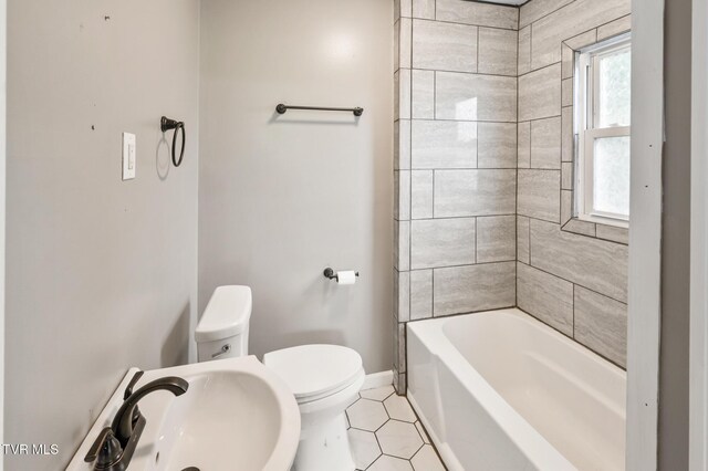 23249 Marys Chapel Rd, Bristol, VA 24202 - bathroom featuring baseboards, a sink, toilet, and tile patterned flooring