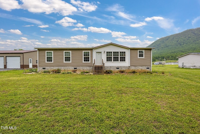 100 Colyer Rd, Greeneville, TN 37743 - view of front facade featuring crawl space, a mountain view, a front yard, and a garage