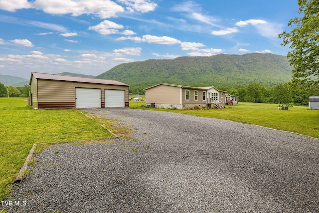 100 Colyer Rd, Greeneville, TN 37743 - view of front facade with a mountain view, an outbuilding, crawl space, and a garage