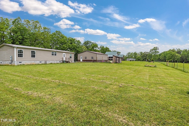 100 Colyer Rd, Greeneville, TN 37743 - view of yard with view of wooded area and an outbuilding