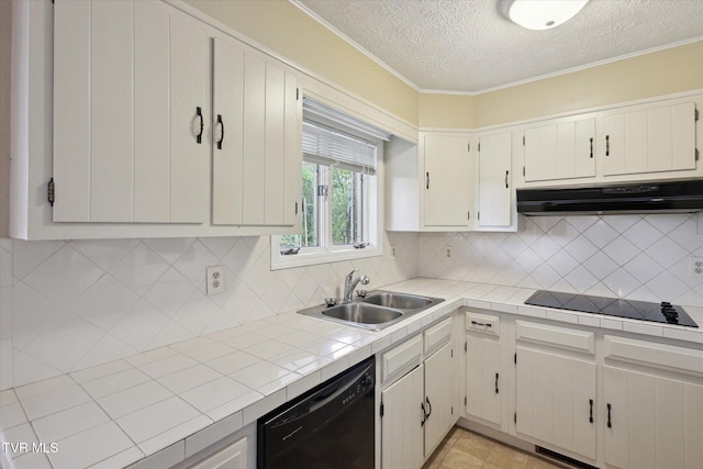 kitchen with black appliances, under cabinet range hood, a sink, a textured ceiling, and decorative backsplash