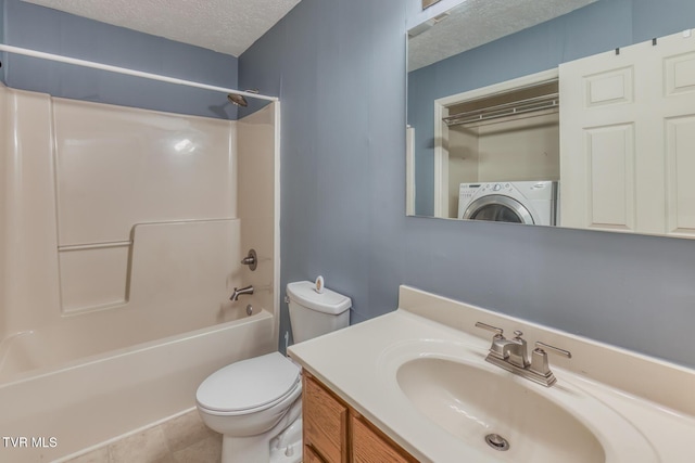 bathroom with toilet, washer / dryer, vanity, a textured ceiling, and  shower combination