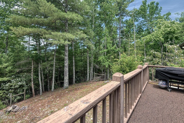 deck featuring a grill