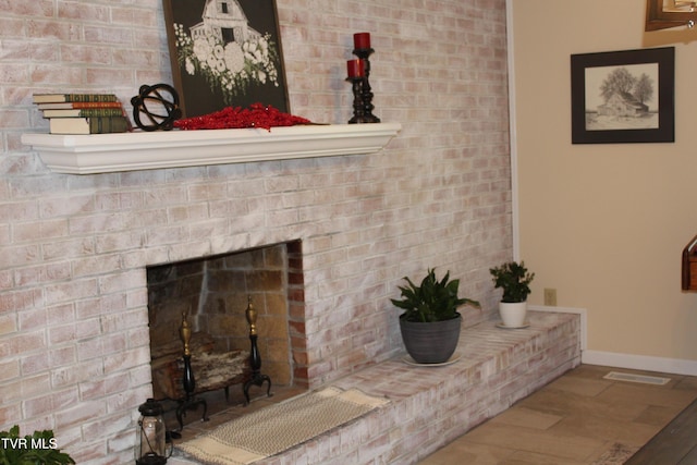 detailed view of baseboards and wood finished floors