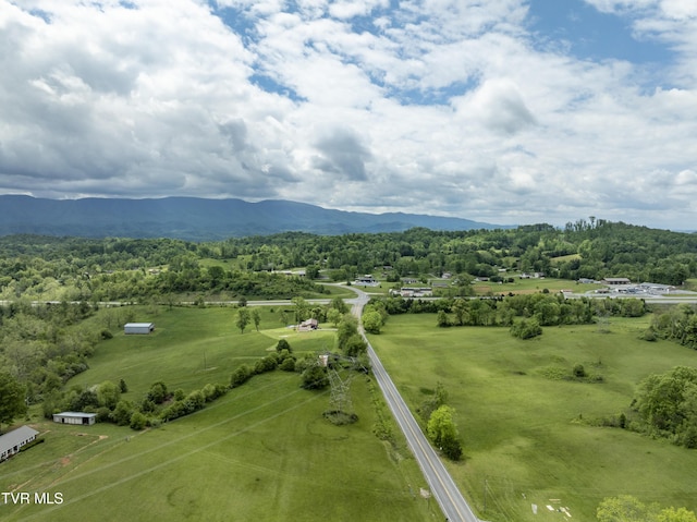 view of rural area with a mountain backdrop