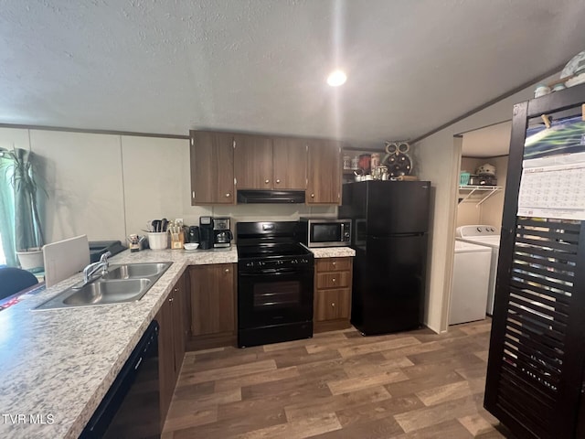 28529 US Highway 23, Big Stone Gap, VA 24219 - kitchen featuring a sink, black appliances, under cabinet range hood, light wood-style flooring, and light countertops