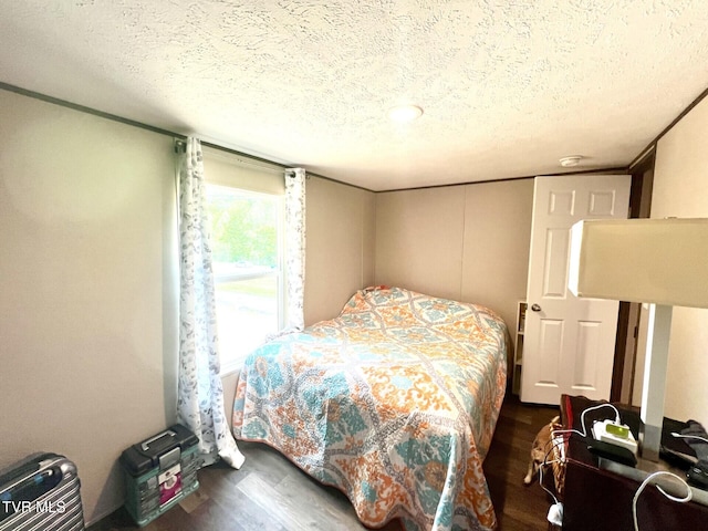 28529 US Highway 23, Big Stone Gap, VA 24219 - bedroom with a textured ceiling and wood finished floors