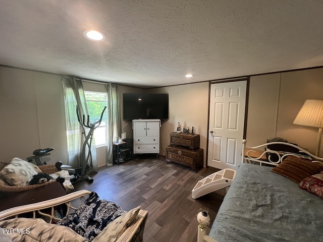 28529 US Highway 23, Big Stone Gap, VA 24219 - bedroom featuring dark wood-style flooring, a textured ceiling, and recessed lighting