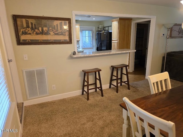 214 Elliott, Erwin, TN 37650 - carpeted dining area featuring baseboards