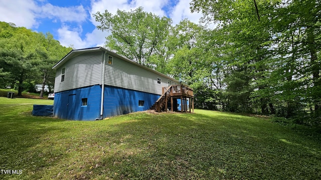824 W Buckner Ave, Big Stone Gap, VA 24219 - back of house with stairway, a deck, and a yard