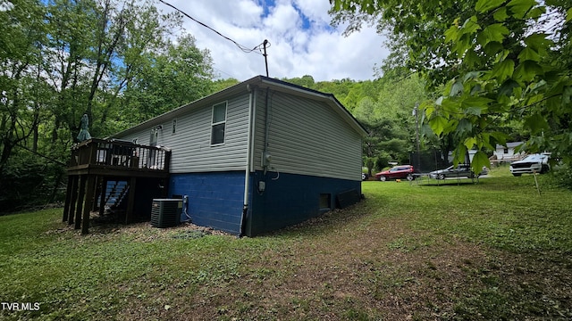 824 W Buckner Ave, Big Stone Gap, VA 24219 - view of side of home with a deck, a yard, and central air condition unit