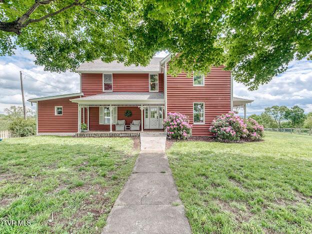 26354 Pewter Ln, Abingdon, VA 24211 - view of front of property with a porch and a front lawn