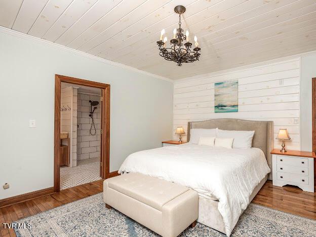 26354 Pewter Ln, Abingdon, VA 24211 - bedroom featuring a chandelier, wood finished floors, crown molding, wooden ceiling, and baseboards