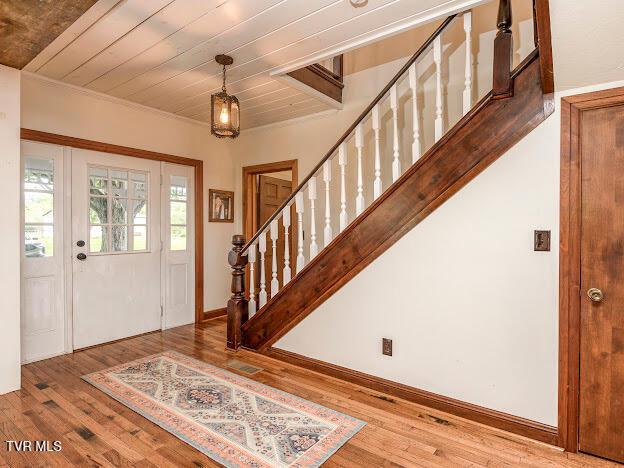 26354 Pewter Ln, Abingdon, VA 24211 - foyer entrance featuring wood finished floors, stairs, baseboards, and wood ceiling