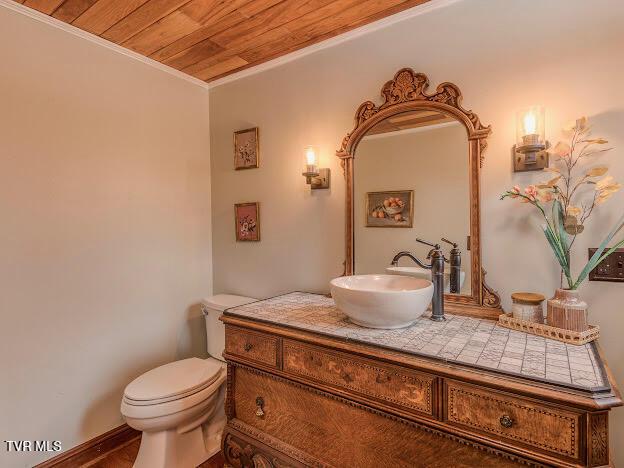 26354 Pewter Ln, Abingdon, VA 24211 - half bathroom featuring wood ceiling, vanity, crown molding, and toilet