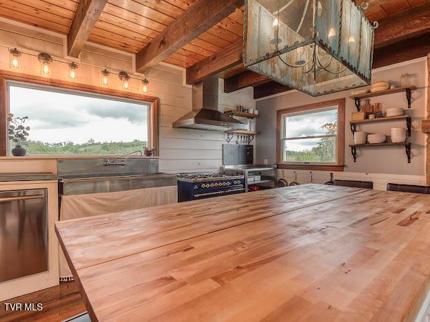 26354 Pewter Ln, Abingdon, VA 24211 - kitchen featuring wood counters, wall chimney exhaust hood, wood ceiling, open shelves, and beam ceiling