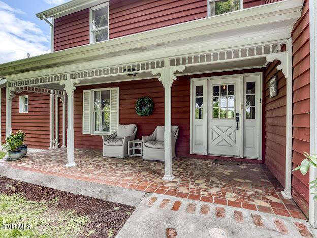 26354 Pewter Ln, Abingdon, VA 24211 - doorway to property featuring covered porch