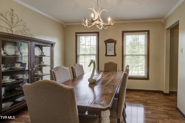 719 W Valley Dr, Kingsport, TN 37664 - dining room featuring healthy amount of natural light, a chandelier, crown molding, a textured ceiling, and dark wood finished floors