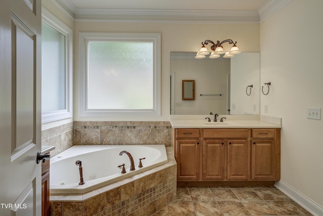 bathroom with vanity, a whirlpool tub, and ornamental molding