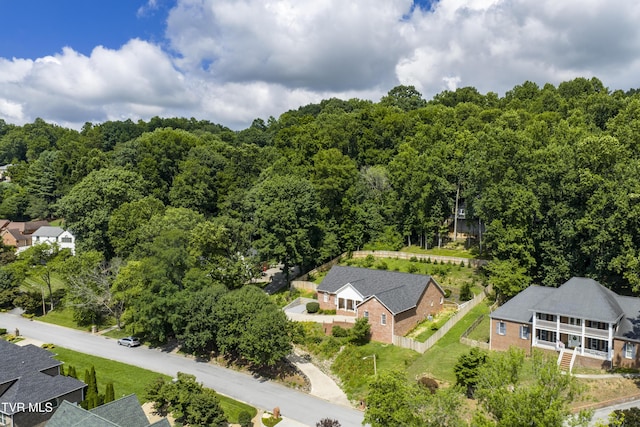 view from above of property featuring a forest