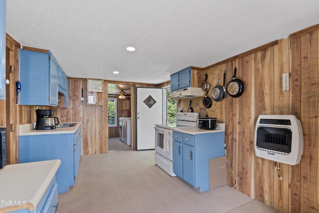 590 Kingsport Hwy, Greeneville, TN 37745 - kitchen with blue cabinetry, white electric range oven, heating unit, wood walls, and under cabinet range hood