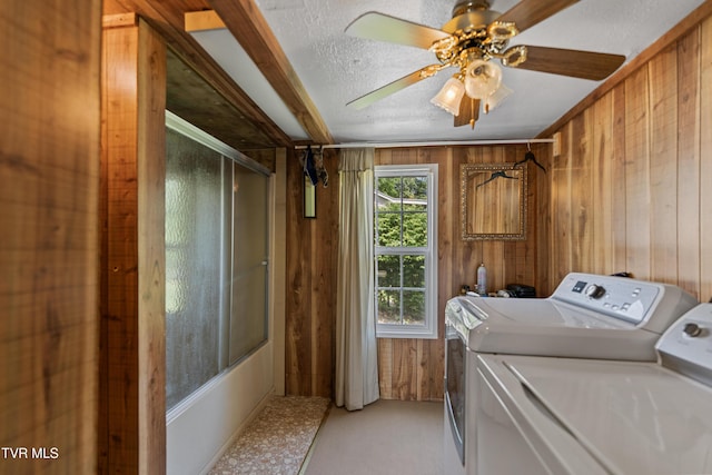 590 Kingsport Hwy, Greeneville, TN 37745 - washroom with washing machine and clothes dryer, wood walls, light carpet, and ceiling fan