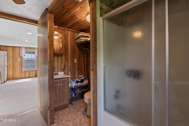 590 Kingsport Hwy, Greeneville, TN 37745 - full bath featuring wood walls, a shower with door, toilet, wooden ceiling, and vanity