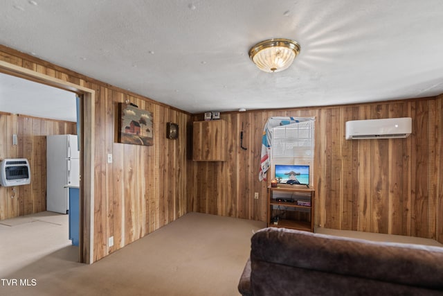 590 Kingsport Hwy, Greeneville, TN 37745 - living room with a wall unit AC, wooden walls, carpet flooring, and heating unit