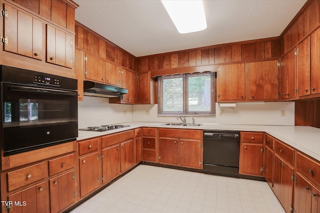 4401 Beechcliff Dr, Kingsport, TN 37664 - kitchen featuring black appliances, a sink, under cabinet range hood, light countertops, and a textured ceiling