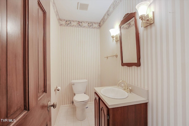 4401 Beechcliff Dr, Kingsport, TN 37664 - bathroom with toilet, vanity, wallpapered walls, and tile patterned floors