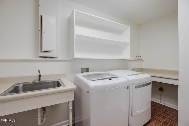 4401 Beechcliff Dr, Kingsport, TN 37664 - laundry area with washing machine and clothes dryer, brick patterned floors, and baseboards