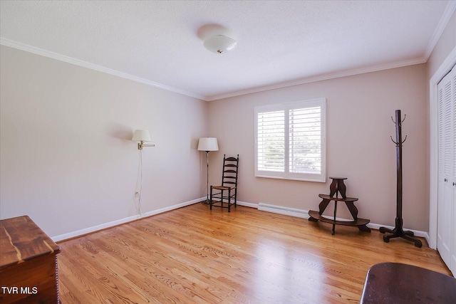 4401 Beechcliff Dr, Kingsport, TN 37664 - miscellaneous room featuring light wood-type flooring, crown molding, baseboard heating, and baseboards