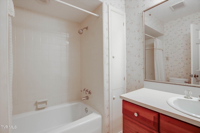 4401 Beechcliff Dr, Kingsport, TN 37664 - bathroom with shower / tub combo, wallpapered walls, vanity, and toilet