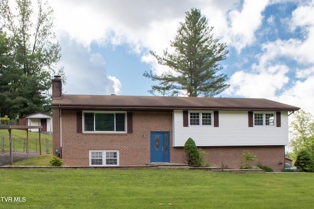 7324 White Pine Cir, Bristol, VA 24202 - bi-level home with brick siding, a chimney, and a front lawn