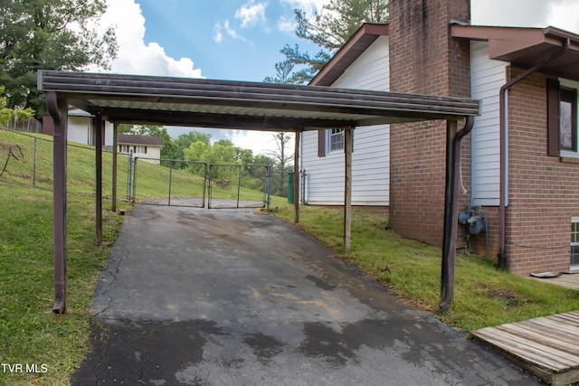 7324 White Pine Cir, Bristol, VA 24202 - view of parking / parking lot featuring driveway, a carport, and a gate